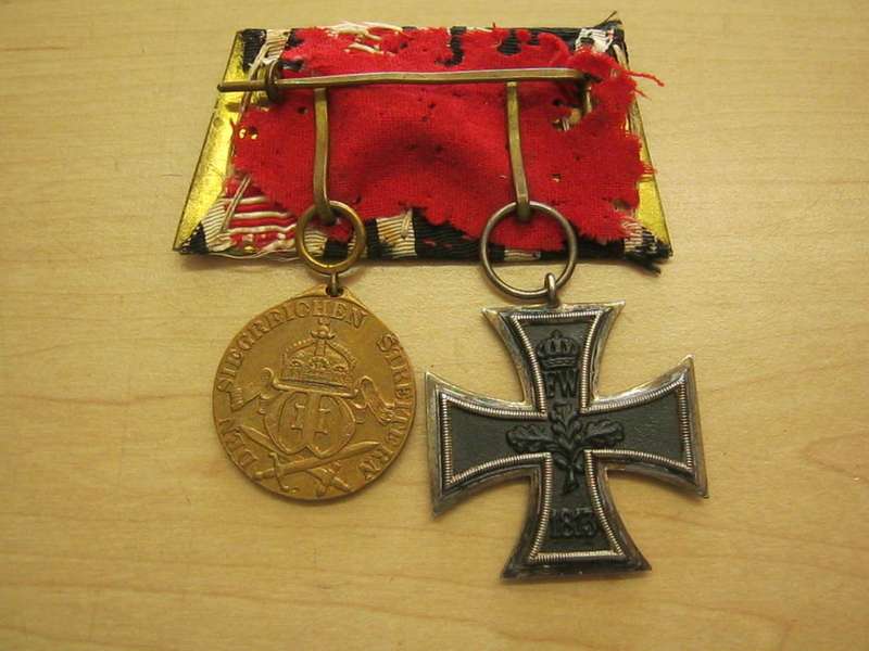 German Iron Cross and GSWA campaign medal with bar.